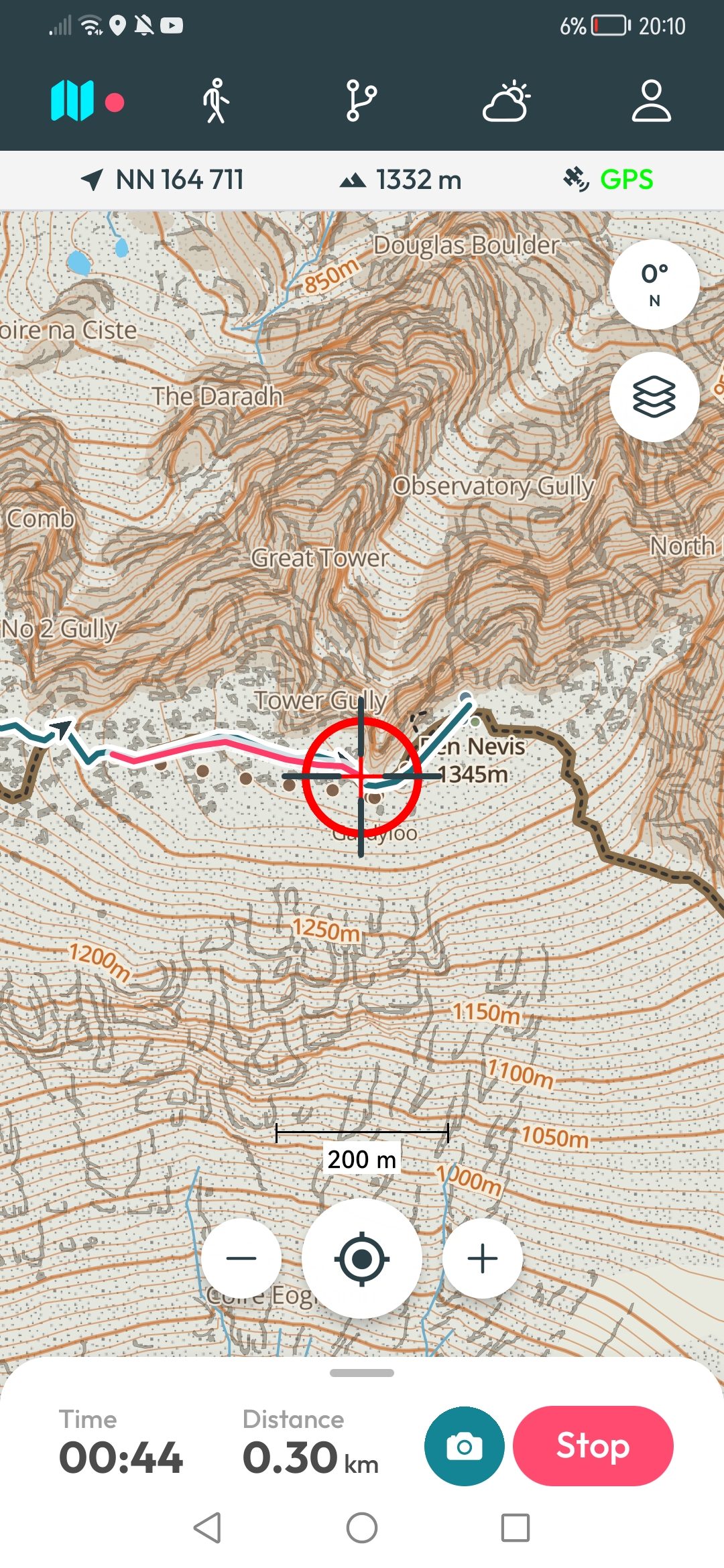 Grid90 navigating live on Ben Nevis: a detailed contour map with the route line, position crosshair, grid reference and altitude readout